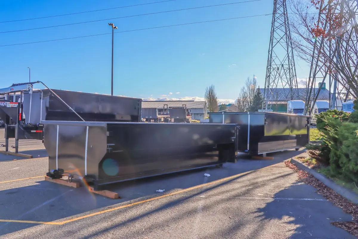 Roll-off dumpster ready for waste disposal at job site for Construction Dumpster Rental in Maryville